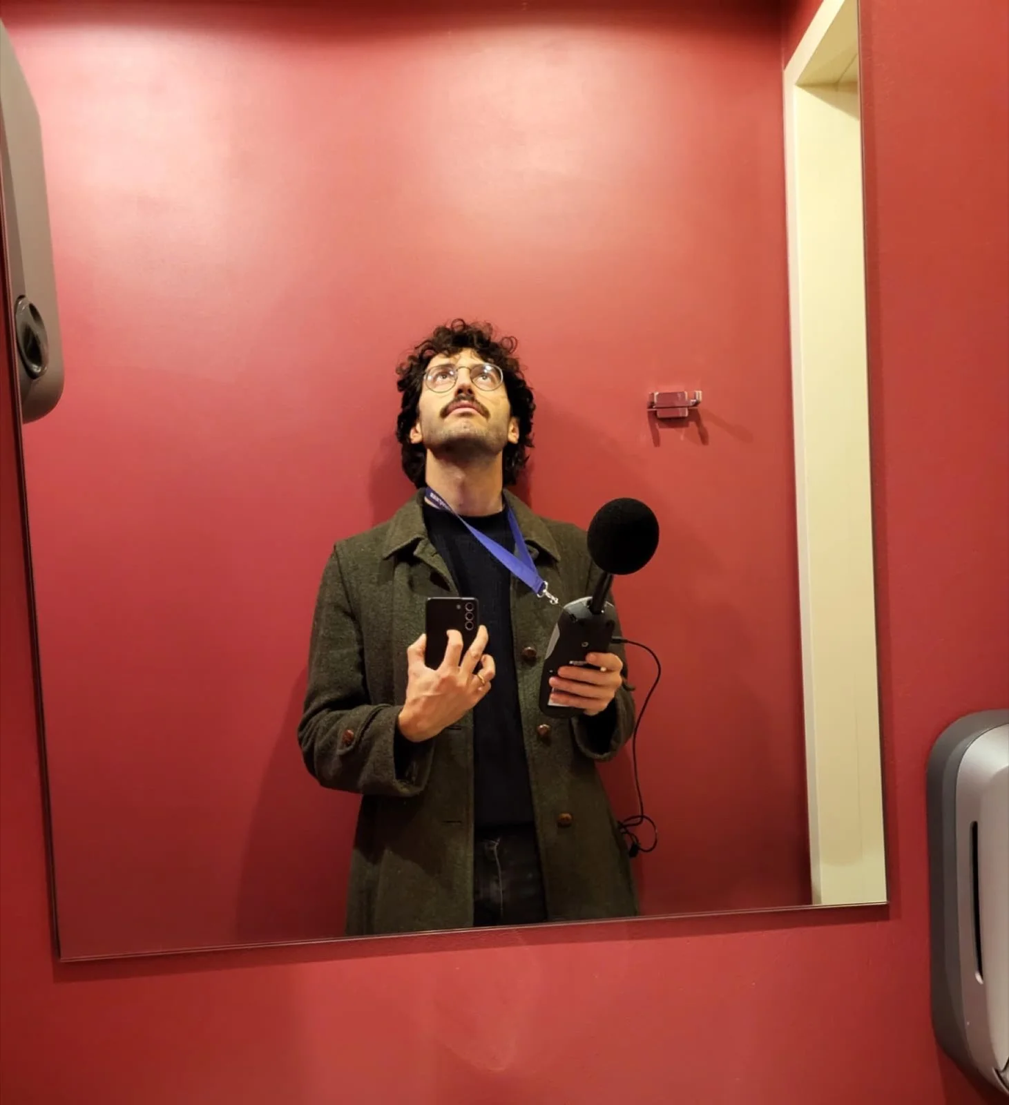 Lorenzo taking a sound level measurement