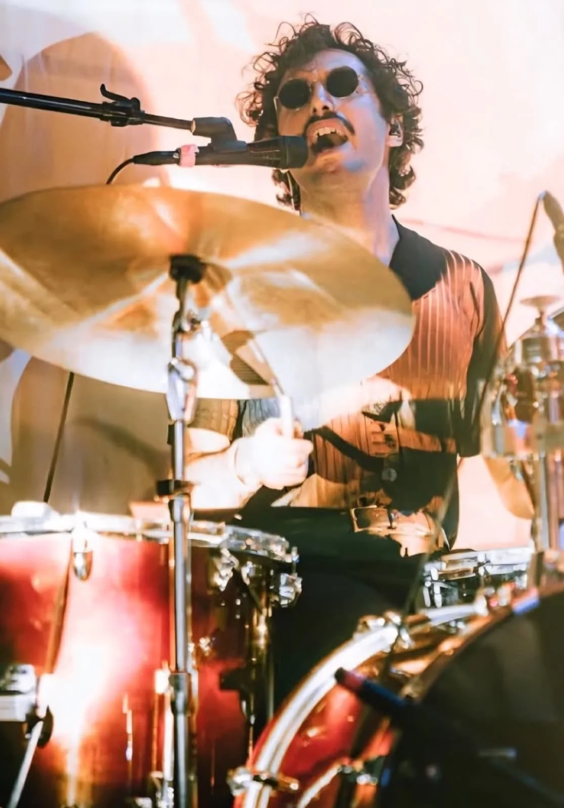 Singing and playing during a live set
